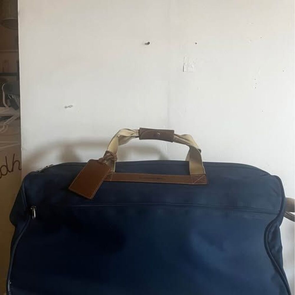 Lancel Weekender Bag no strap offers accepted 
	•	Blue
